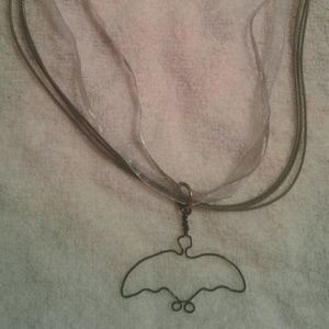 A wire formed bat pendant/necklace PRICE IS FIRM